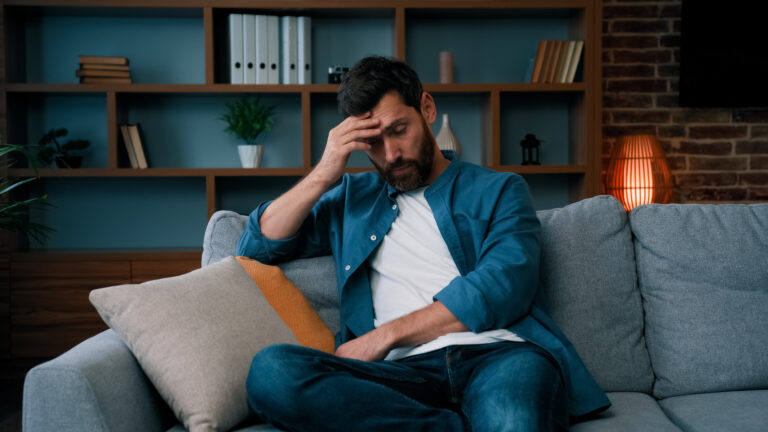 Man dealing with irritable male syndrome (IMS) due to low testosterone levels