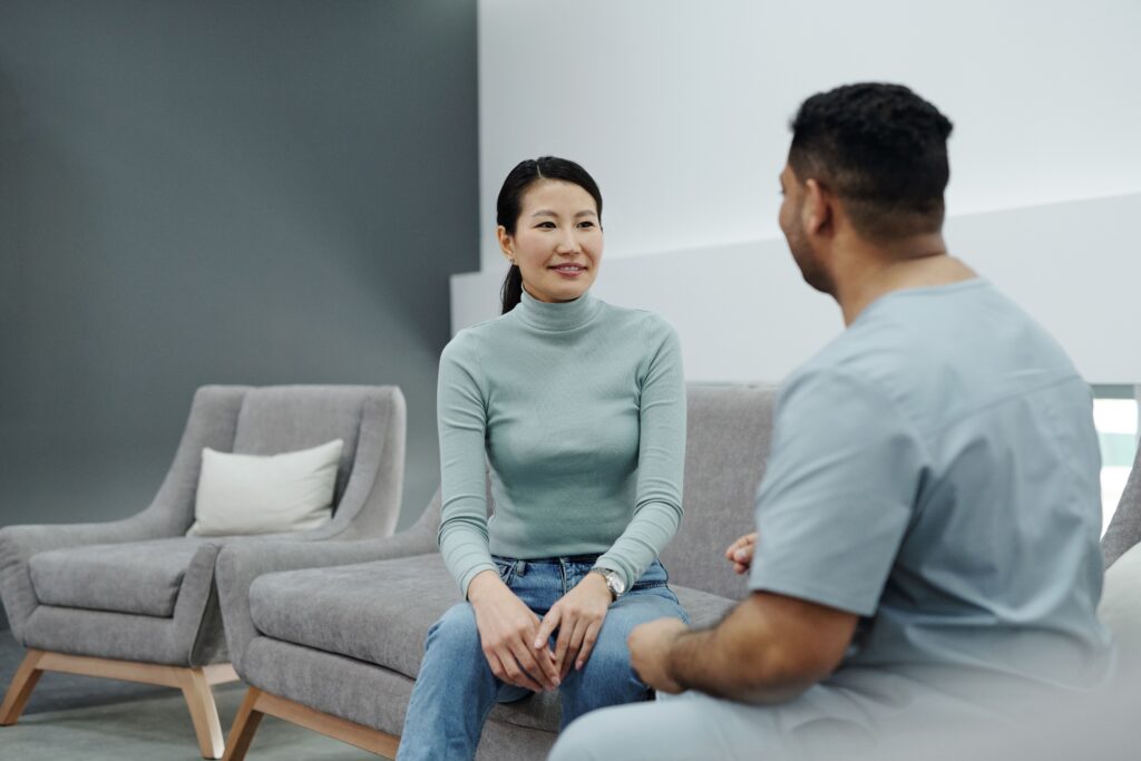 Menopause hormone therapy: woman discussing treatment options with her doctor