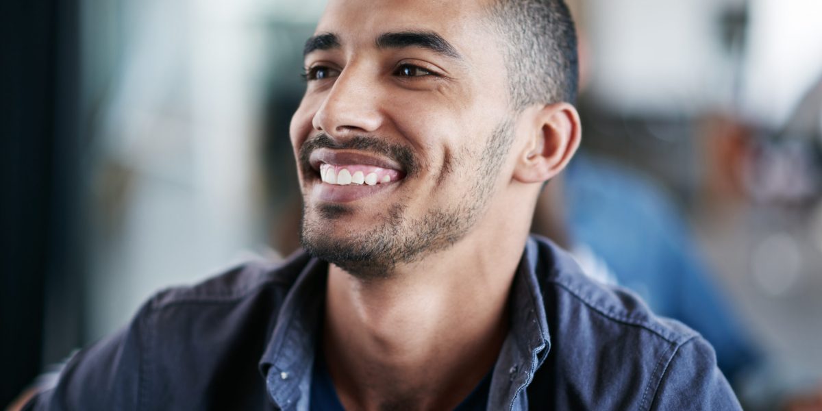 happy man with optimal testosterone levels navigating the transformation with HRT, hormone replacement therapy for low testosterone